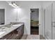 Bathroom boasts granite counters, dual sinks, and a modern glass shower at 500 Creek Valley Dr, Fuquay Varina, NC 27526