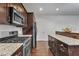 Updated kitchen features stainless steel appliances, granite countertops, and lots of cabinets at 500 Creek Valley Dr, Fuquay Varina, NC 27526