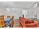 Cozy living room area showing the dining area with hardwood floors and an open space concept at 500 Creek Valley Dr, Fuquay Varina, NC 27526