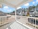 Relaxing covered balcony with views of the neighborhood at 5841 Wynmore Rd, Raleigh, NC 27610
