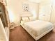 Bright bedroom with a large bed, white linens, and natural light, creating a serene and inviting atmosphere at 5841 Wynmore Rd, Raleigh, NC 27610