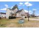 Charming two-story home featuring a well-manicured lawn and inviting front porch at 5976 Jones Farm Rd, Wake Forest, NC 27587