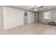 Bedroom showcases multiple closets, neutral carpeting, a ceiling fan and good natural light at 612 W Chisholm St, Sanford, NC 27330