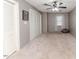 Spacious bedroom features neutral carpeting and multiple closets for ample storage at 612 W Chisholm St, Sanford, NC 27330