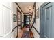 Inviting entryway showcasing hardwood floors, elegant decor, and a view of the staircase and front door at 612 W Chisholm St, Sanford, NC 27330