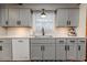 Updated kitchen featuring granite countertops, stainless appliances, and ample lighting at 612 W Chisholm St, Sanford, NC 27330