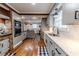 Modern kitchen features stainless steel appliances, granite countertops, and ample storage at 612 W Chisholm St, Sanford, NC 27330