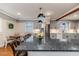 Spacious kitchen with granite countertops, stainless steel appliances, and breakfast nook at 612 W Chisholm St, Sanford, NC 27330