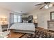 Beautifully appointed main bedroom features natural light, a ceiling fan, and a plush rug at 612 W Chisholm St, Sanford, NC 27330