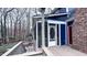 This home features a covered back deck with access to the screened-in porch and backyard at 6317 Lakeland Dr, Raleigh, NC 27612