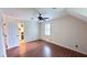 Bright bedroom features hardwood floors and is conveniently located next to the kitchen at 6317 Lakeland Dr, Raleigh, NC 27612