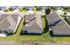 Beautiful aerial perspective of a home with well-maintained landscaping and green lawn at 65 Balsam Ln, Clayton, NC 27527