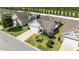 Aerial view capturing a lovely home with a screened porch and nicely landscaped surroundings at 65 Balsam Ln, Clayton, NC 27527