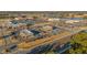 Aerial view of community area featuring stores, restaurants, and shops at 65 Balsam Ln, Clayton, NC 27527