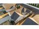 An aerial view showcases an enclosed porch and outdoor seating on the patio at 65 Balsam Ln, Clayton, NC 27527