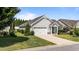 Inviting one-story home boasts a two-car garage, a well-kept lawn, and charming curb appeal at 65 Balsam Ln, Clayton, NC 27527