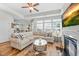 Spacious living area with fireplace and hardwood flooring throughout at 65 Balsam Ln, Clayton, NC 27527