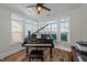 Bright room featuring a grand piano and natural light streaming through multiple windows at 65 Balsam Ln, Clayton, NC 27527