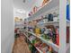 Walk-in pantry with organized shelving providing lots of storage space at 65 Balsam Ln, Clayton, NC 27527
