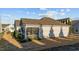 The rear exterior has a screened in porch, siding, and is set on a grassy lawn at 65 Balsam Ln, Clayton, NC 27527