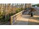 Community wooden walkway that leads through a wooded common area of the neighborhood at 65 Balsam Ln, Clayton, NC 27527
