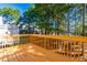 Backyard deck space with tall trees at 707 Sutter Gate Ln, Morrisville, NC 27560