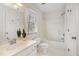 Bright bathroom with a shower and tub combination plus a white vanity at 708 Midsummer Ln, Apex, NC 27502