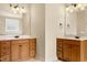 Bathroom with double vanities and ample storage at 7373 Newport Ave, Raleigh, NC 27613