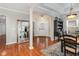 Bright foyer with hardwood floors, high ceilings, and elegant architectural details at 812 Canyoncreek Ln, Fuquay Varina, NC 27526