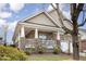Inviting single-story brick home with a covered front porch perfect for relaxing at 812 Canyoncreek Ln, Fuquay Varina, NC 27526