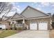 Beautifully designed single-story home with well-maintained landscaping and a two-car garage at 812 Canyoncreek Ln, Fuquay Varina, NC 27526