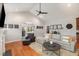 Comfortable living area featuring a cozy seating arrangement, hardwood floors, and an open layout at 812 Canyoncreek Ln, Fuquay Varina, NC 27526