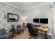 Well-appointed home office with a modern desk setup, comfortable seating, and stylish decor for productivity at 812 Canyoncreek Ln, Fuquay Varina, NC 27526