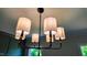 Close up of modern chandelier with six lights at 83 Nottoway Lane, Wendell, NC 27591