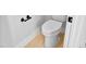 Clean and modern toilet with a minimalist design and efficient use of space at 83 Nottoway Lane, Wendell, NC 27591