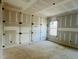 New bedroom with fresh drywall, natural light from a window, and modern design at 83 Nottoway Lane, Wendell, NC 27591