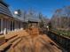 Expansive wooden deck features a built-in outdoor kitchen, perfect for entertaining guests at 101 Rutherglen Dr, Cary, NC 27511