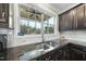 Gourmet kitchen featuring granite countertops, stainless steel sink and subway tile backsplash at 1016 Traditions Meadow Dr, Wake Forest, NC 27587