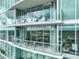 Spacious balcony with glass railings offers stunning city views at 110 N Corcoran St # 2304, Durham, NC 27701
