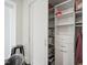 Well-organized closet with shelving and drawers for optimal storage solutions at 110 N Corcoran St # 2304, Durham, NC 27701