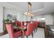 Chic dining room featuring a large table, stylish sideboard, and art at 110 N Corcoran St # 2304, Durham, NC 27701