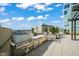 A well-equipped outdoor grill and food prep station for residents to enjoy outdoor cooking at 110 N Corcoran St # 2304, Durham, NC 27701