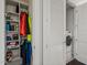 Ample storage with shelving and hanging space near the laundry area at 110 N Corcoran St # 2304, Durham, NC 27701