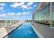 Rooftop pool with city views and lounge chairs, perfect for relaxation and recreation at 110 N Corcoran St # 2304, Durham, NC 27701