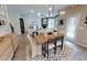 Open-concept living space with modern decor, dining area, and seamless flow at 1105 Freestone Rd, Durham, NC 27703