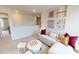 Relaxing loft area with a sectional sofa, game table, and colorful artwork for a cozy retreat at 1105 Freestone Rd, Durham, NC 27703