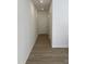 Hallway with wood-look flooring and access to other rooms at 1117 Mountain Crown St, Durham, NC 27704