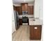 Well-equipped kitchen boasting granite countertops and stainless steel appliances at 1117 Mountain Crown St, Durham, NC 27704