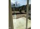 A concrete patio is accessed from a glass door, leading to the backyard at 1117 Mountain Crown St, Durham, NC 27704