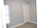 Cozy bedroom with a closet and a window with modern blinds at 1210 Shaw St, Burlington, NC 27217